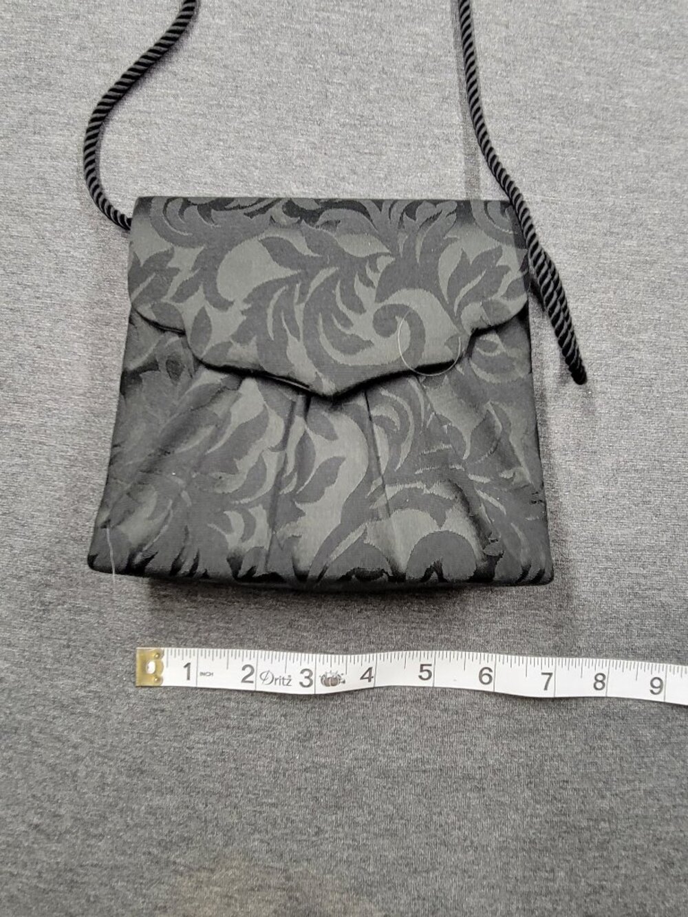 Neiman Marcus purse 7 inches across black good condition
